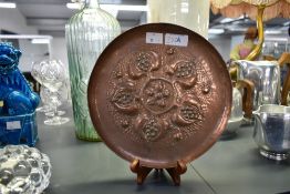 An early 20th century Keswick School of Industrial Arts copper charger, beautifully decorated with