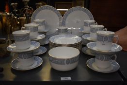 A Atlas Bone China Grimwades part dinner service, decorated having floral pattern on a white ground,