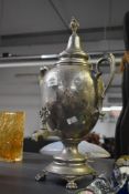 A 19th century Ashberry & Sons silver plated Samovar, the body finely decorated having engraved