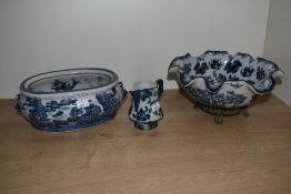 An Ironstone blue and white jardinere, decorated with Chinese landscape scene (missing handles),