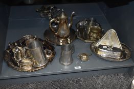 A large selection of silver plated dinner and tea ware, to include tankards, a lidded butter dish,