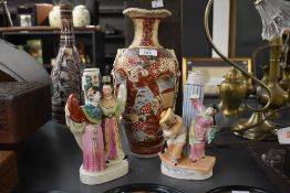 An attractive 20th century Japanese Satsuma vase having blind cord handles to the side terminating