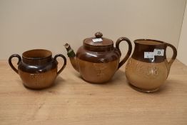 A Royal Doulton stonewareWhisky jug, decorated dated 1658 and RSM, pattern No. 3310, marked The