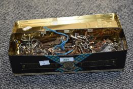 A box containing various keys, to include metal skeleton keys, Yale keys, forged steel key ect.