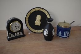 A vintage Wedgwood Guinness 225 Anniversary Jasperware plate, decorated having a central cameo and