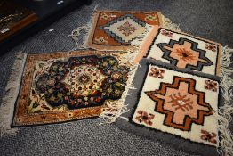 A small Persian style prayer rug, decorated having floral patterns, L60cm, sold together with