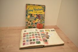 A Stanley Gibbons Gay Venture Stamp Album and a Nelson Stamp Album, both holding various collections