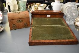 A late 19th / early 20th century burr wood writing slope, interior with green felt, the top fitted