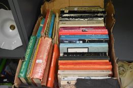 A box containing various novels, to include An Awfully Big Adventure by Beryl Bainbridge, Great
