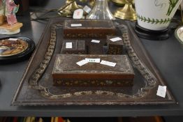 A late 19th / early 20th century brass desk set, beautifully decorated in the Indian biennes