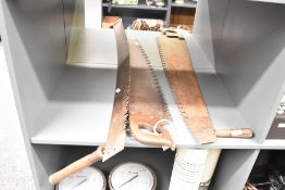 A large vintage tree surgeon saw, L103cm, sold together with a double handed crosscut saw, L140cm