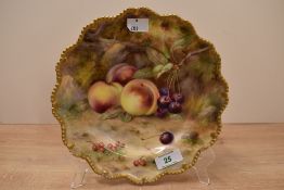 A Royal Worcester handpainted porcelain plate, painted with fallen cherries and peaches against a