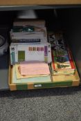 A box containing various picture cards, first day covers and stamps, to include 'Trees in Britain'