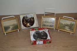 Two 19th century miniature ceramic oval plaques, hand coloured depicting landscape scenes, H7cm,