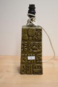 In the manner of Bernard Rooke - A mid-century resin triangular table lamp, decorated having a