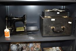 An early/mid - 20th century portable Singer sewing machine, pattern No.221K1, to include carry case,