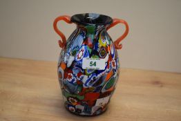 A vintage 'Tutti Frutti' Murano style glass vase, having short neck with twin handles, h16cm