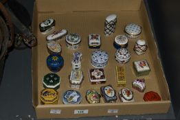 A collection of DelPrado hand finished fine porcelain miniature trinket boxes, to include a yellow