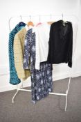 Seven pieces of 1970-80s womenswear, including three Laura Ashley garments. A Laura Ashley navy