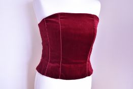 A 2000-2010s Monsoon burgundy velvet corset top, having piped seam structure at the front and