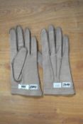 A pair of vintage pigskin leather gloves, beige with black contrast hand-stitching. Size 7 1/2.