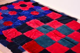 Two vintage handmade cushion fronts, featuring velvet patchwork construction. One being 16'