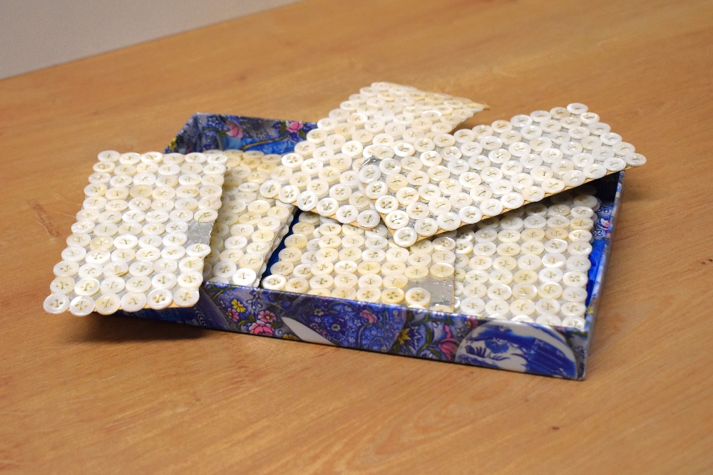 A quantity of vintage freshwater-shell shirt buttons, held in place on silver card with green - Image 11 of 15
