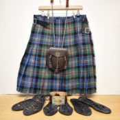 A vintage collection of traditional Scottish dance clothing, paraphernalia, and documents,