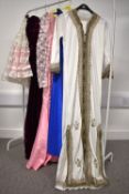 A collection of vintage womenswear, comprising 1970-80s party dresses, including homemade