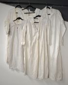 Five Victorian and early 20th century white cotton dresses, shifts, and / or nightgowns, one