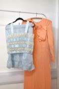 A collection of 1920-30s ladies clothing, comprising: A long dress in apricot crepe with a row of