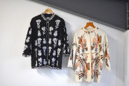Two 1960s-1970s The Foreign Look embroidered jackets. A Black cotton jacket with intricate vut-out