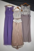 Eight modern bridesmaid's dresses, all full length, having various cuts and styles, comprising