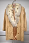 A J. Percy for Marvin Richards Made in U.S.A. 3/4 length coat in beige leather, featuring a dramatic
