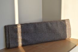 A bolt of 100% pure new wool, in a textural taupe and brown houndstooth, 3m long and 150cm (60