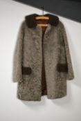 Two 1650-1960s beautiful shearling coats. A grey 3/4 length example with silky soft-feel