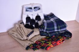 Three twentieth century kilts and rabbit fur sporran. A Macnab of Haddington hand tailored kilt in