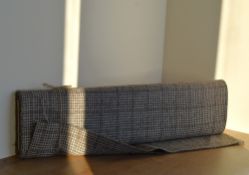 A bolt of 100% pure new wool, in a cream and brown houndstooth, 6.5m long and 150cm (60 inches)