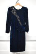 A 1980's Hildegarde Sausik dress, in midnight blue velvet, featuring padded shoulders, black