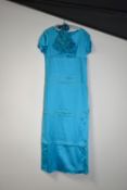 A 1960s young ladies bridesmaid or occasion dress and flower-bomb cap / bonnet, in aqua satin,