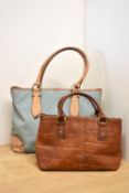 Two vintage Mulberry handbags. A Mulberry baguette bag with cross-body detachable strap,