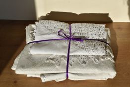 Two examples of 1980s white cotton textiles for the home. An embossed bedspread featuring a floral