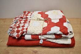 Two midcentury patchwork quilts. A bedspread incorporating an intricate Meribel quilted centre