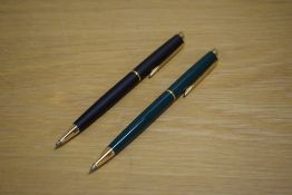 A Waterman Hemisphere ballpoint pen in Matte Black and a Hemisphere propelling pencil in Green