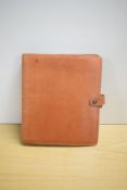 A Filofax tan leather planner 20.5x23.5cm
