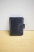 A Filofax Pocket Cavendish model in black deluxe leather 14 x 11cm
