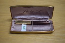 A boxed Parker 51 vacumatic fill fountain pen in Cordovan brown with gold filled blue diamond clip