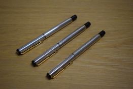 A Parker Rialto converter fill fountain pen and two rollerball pens in Cornith Silver plate