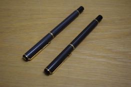 A Parker Rialto converter fill fountain pen and a Rollerball pen in Laque Metallic Grey