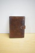 A WA Goold calf skin organiser in brown. 13.5x18.5cm
